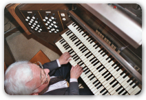 Overheadshot of Man Playing Pipe Organ